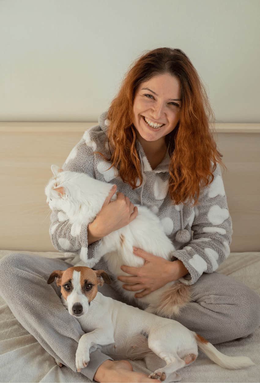 woman whose cat and dog are worth thousands in life satisfaction