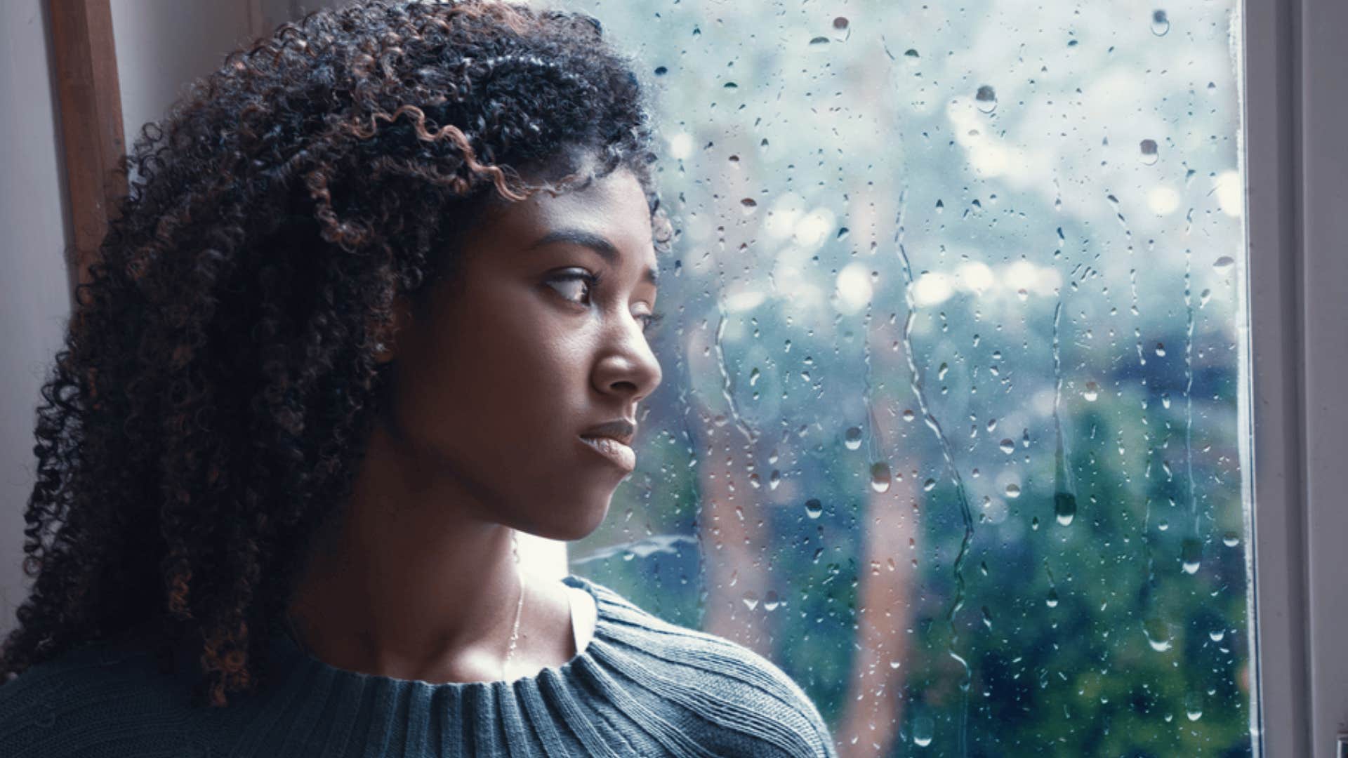 woman reminding herself that its okay to be sad 