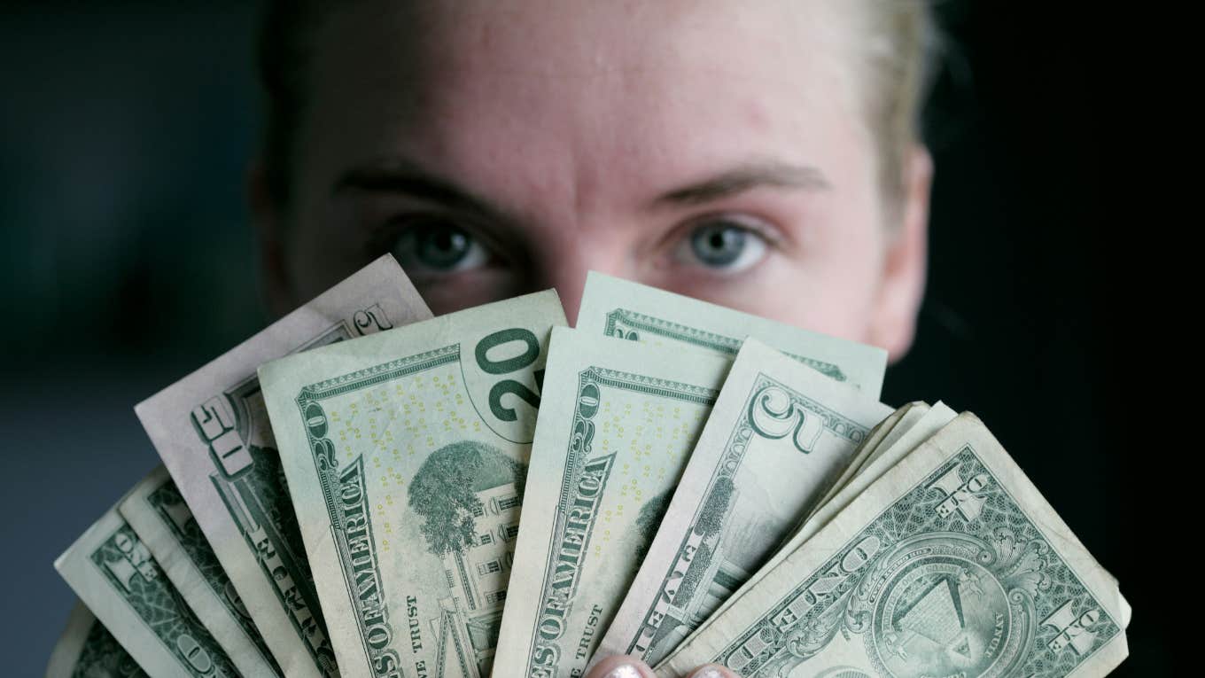 Person talks money.