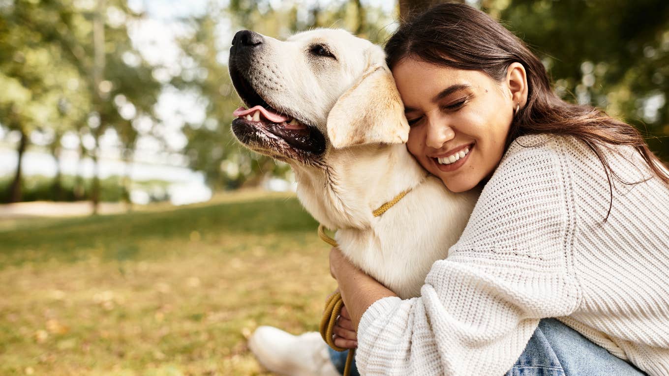 woman and her pet dog