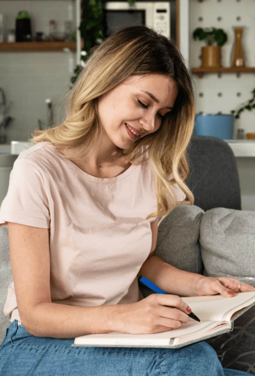 woman focusing on top three of her list 