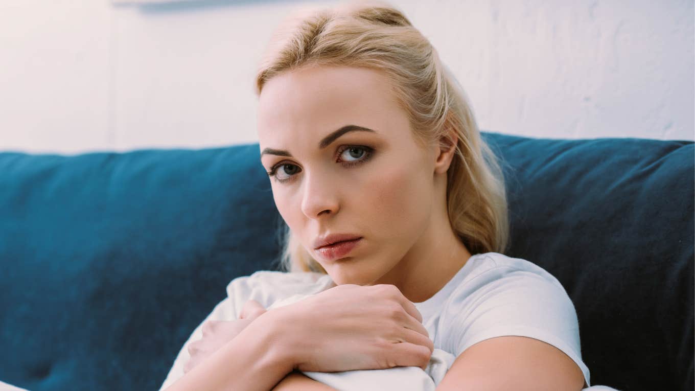 stressed woman carrying a big emotional load