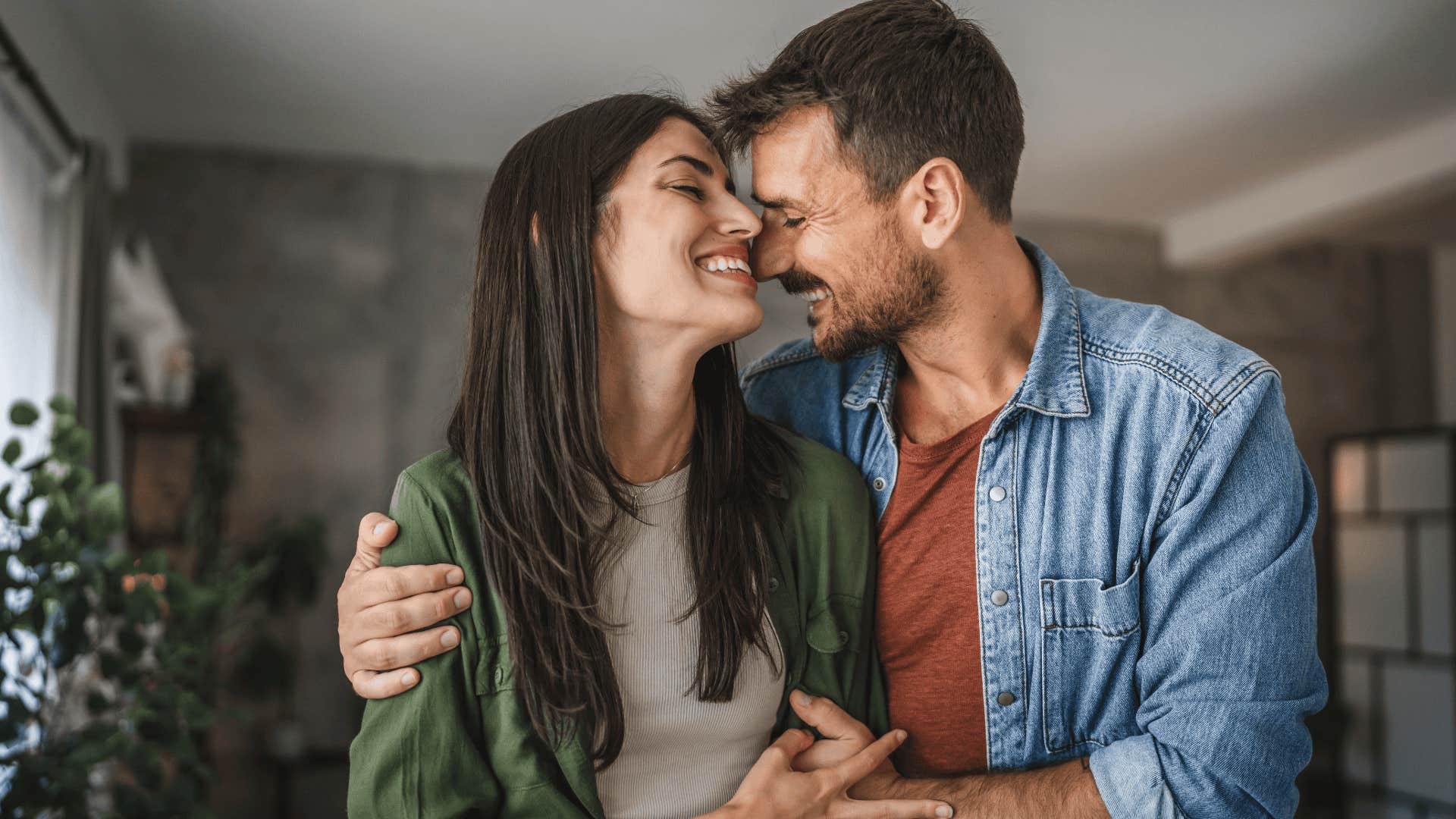 woman being held by man who has wmotional needs in the relationship
