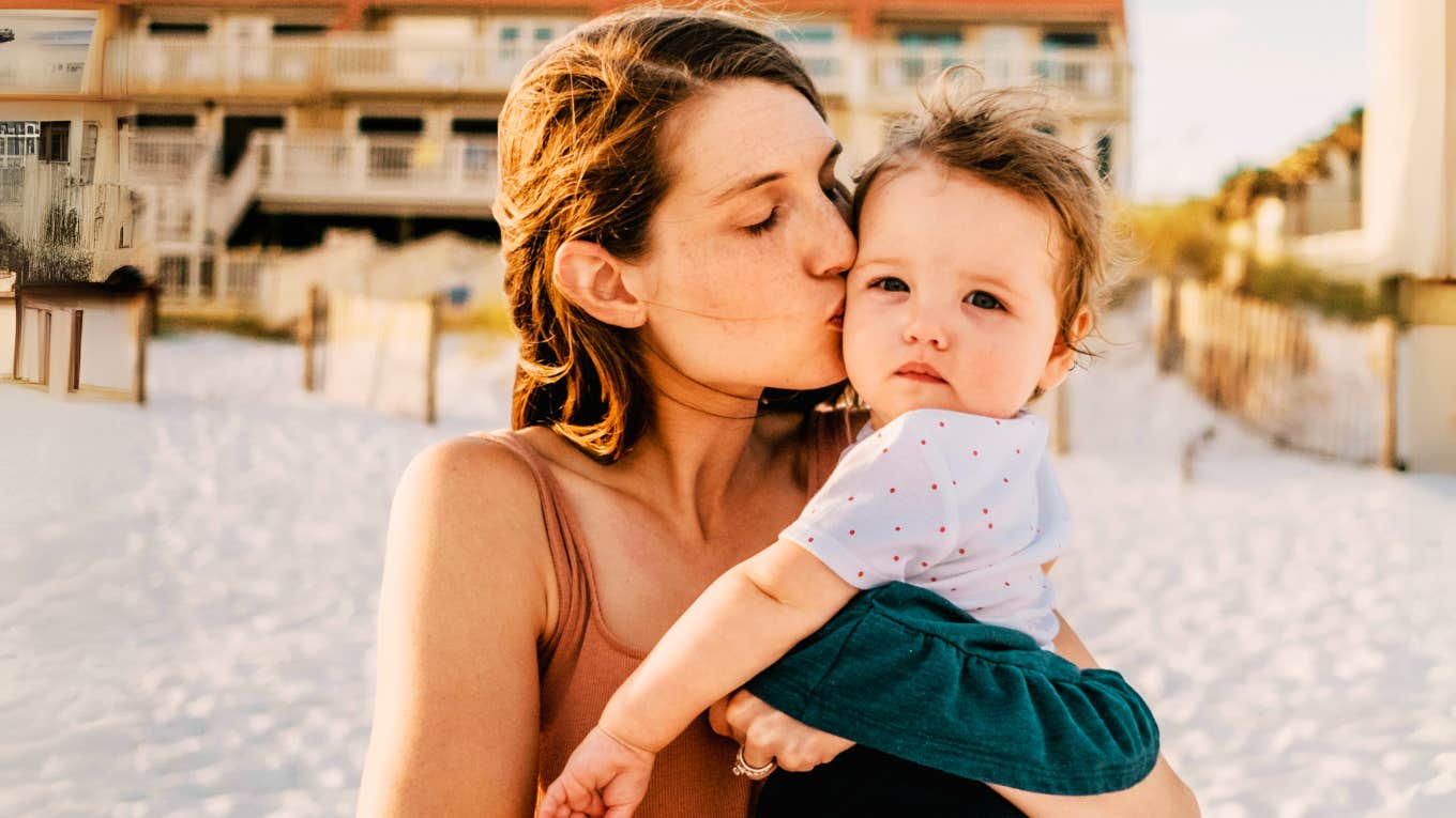 Essential Dos and Don'ts for Raising Kids Who Can Handle Life Well, According To Psychology Mother raising child who can handle life well.