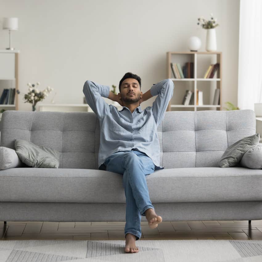 man doing self-care ritual of deep breathing