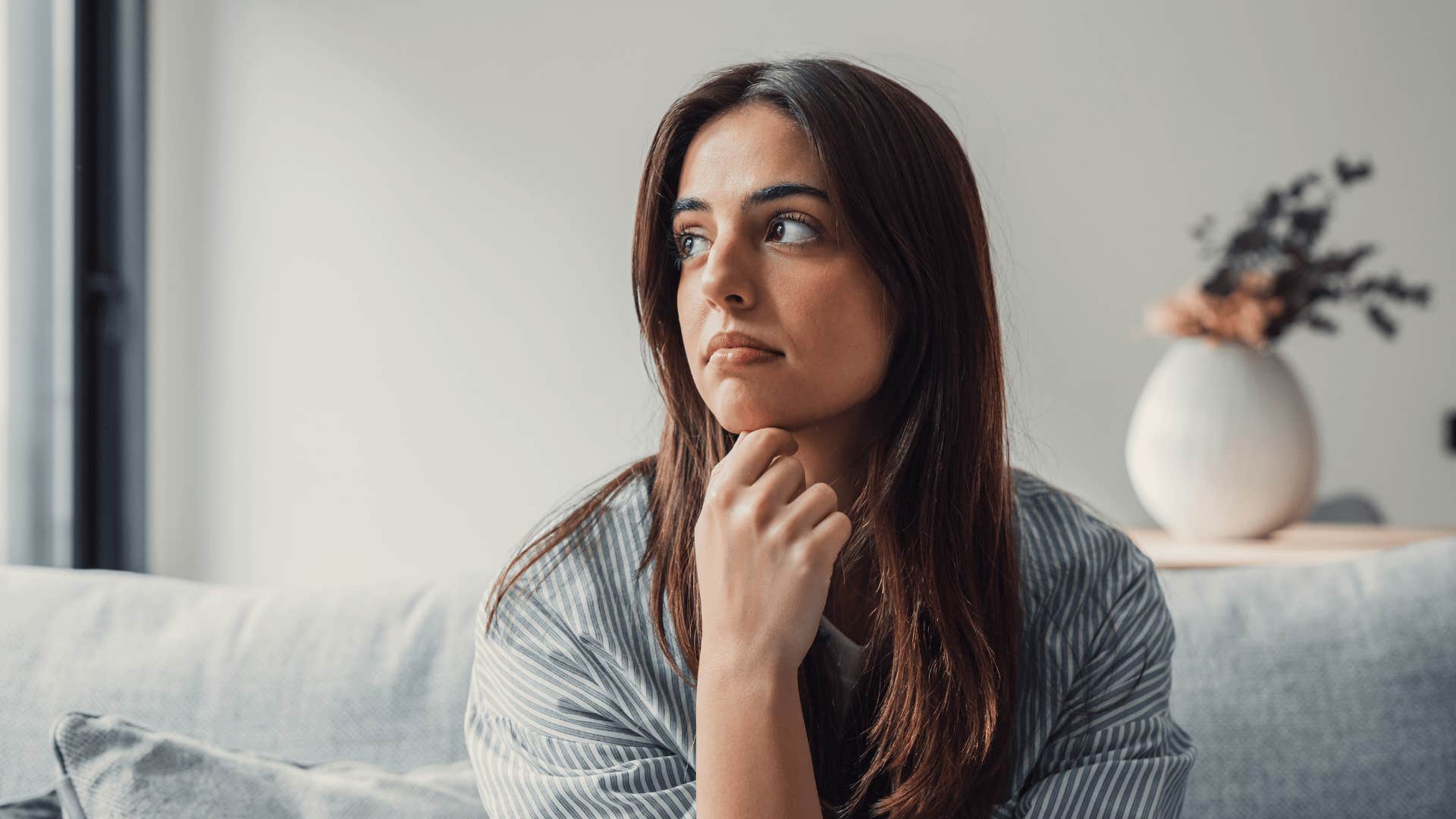 Upset woman who grew up in a dysfunctional home thinking nobody likes her