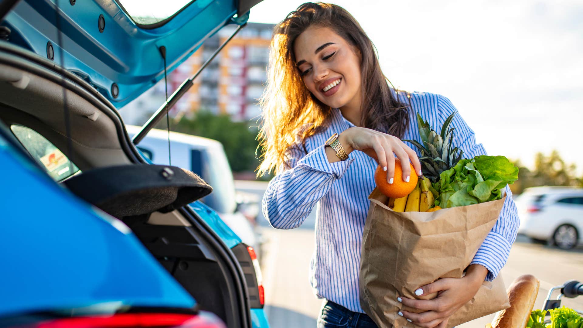 woman using curbside pick-up at the grocery store