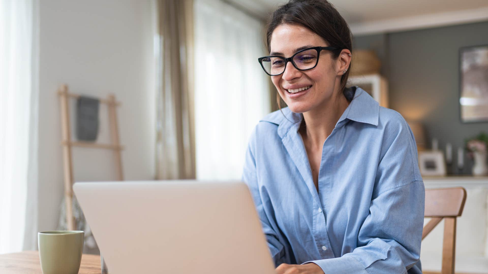 woman downsizing her streaming services using laptop
