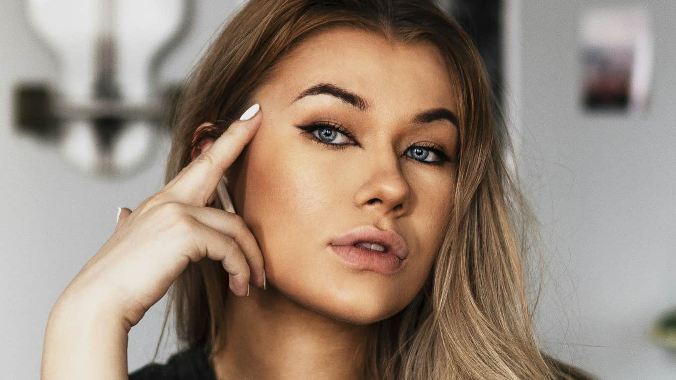 Why Gen-Z Is Getting Fired In Droves — But Employers Aren't Blameless Gen-z woman was fired.