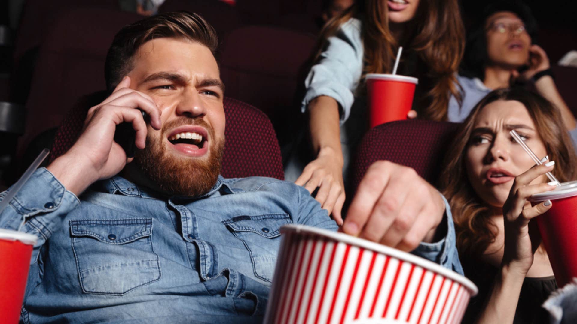 man being disrespectful on phone in movie theater 