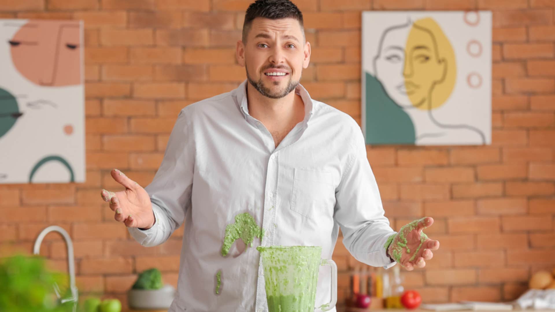 man not taking care of his belongings and getting shirt dirty