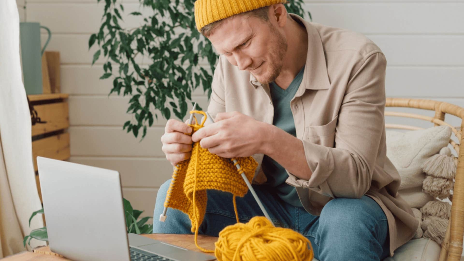 man knitting 