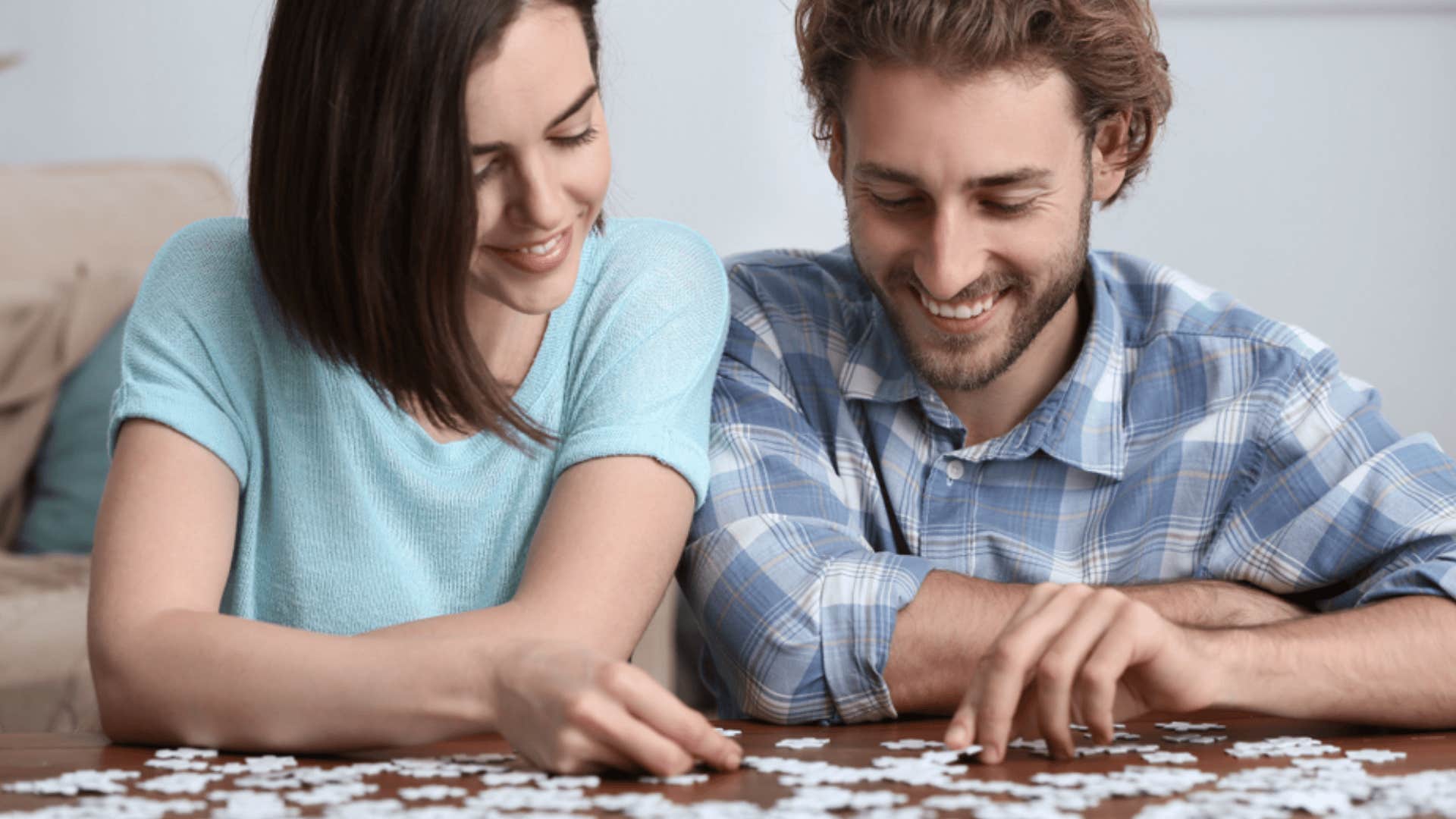 couple solving puzzle 