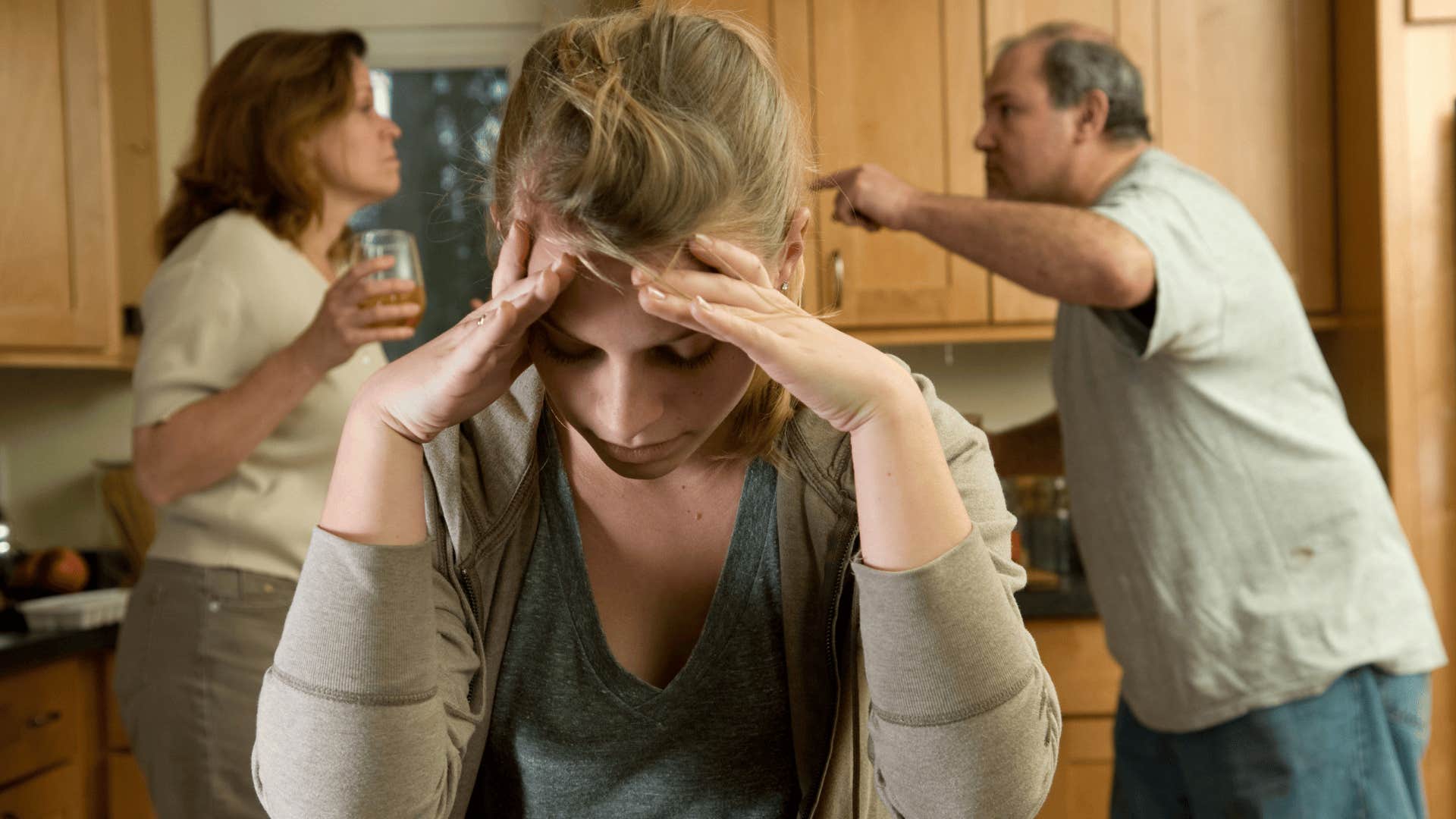 upset child with emotioan chaos and upset parents who had true love before