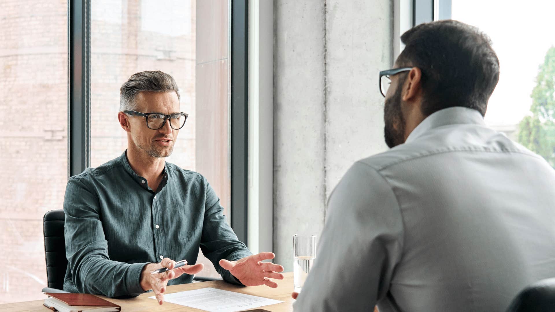 employee asking boss for feedback on his work