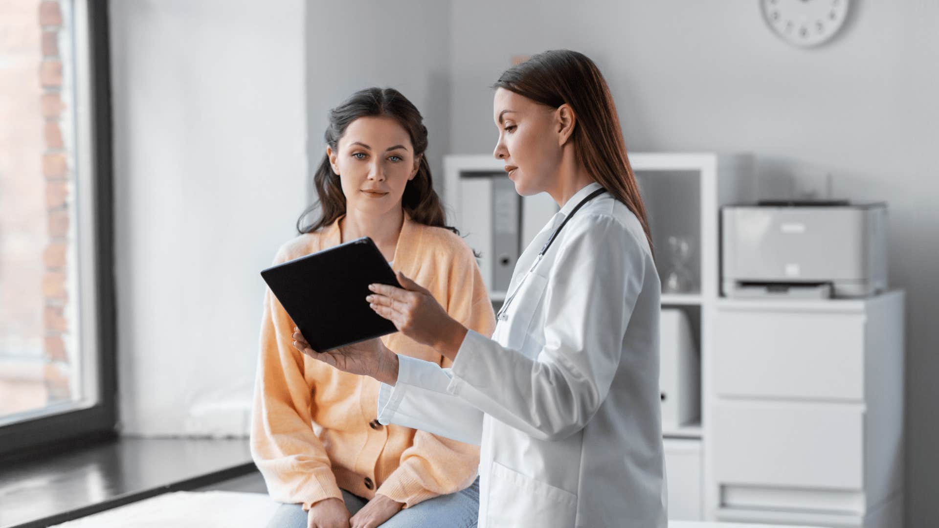 woman during check up at doctors office