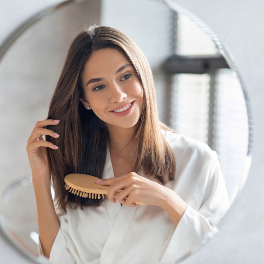 woman looking in mirror mastering emotional maturity