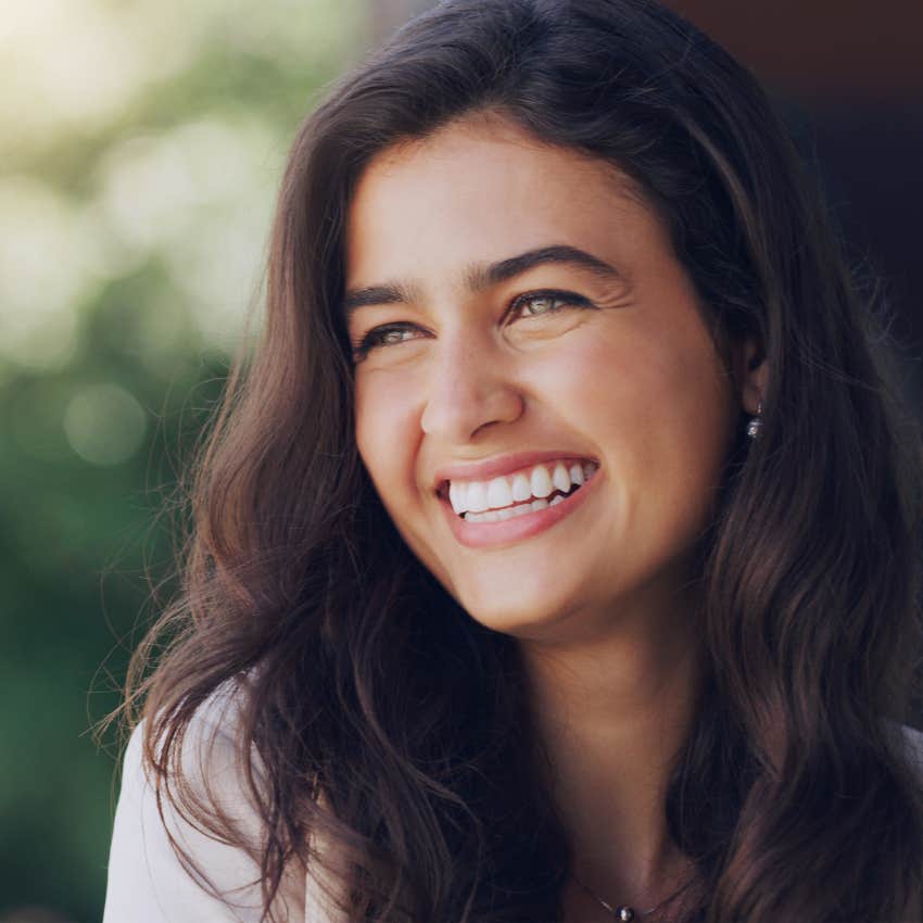 smiling woman who has mastered emotional maturity