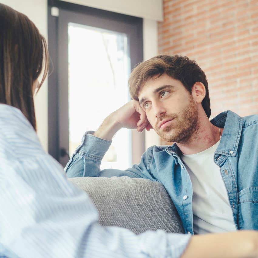 couple talking on couch to help marriage last years