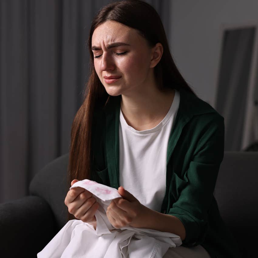 woman who is unable to let go of relationship momentos not over her ex
