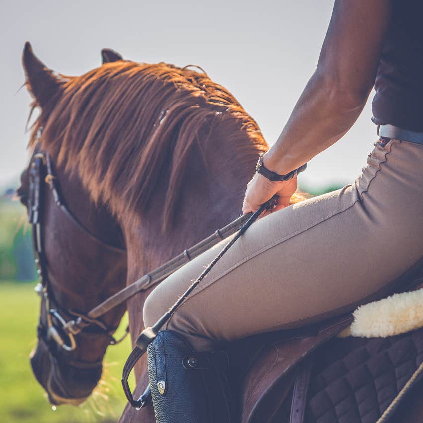 woman afraid on horse