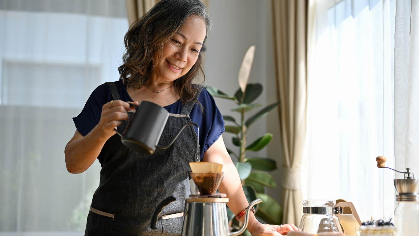 How To Get The Most Coffee From The Fewest Beans, According To Science woman using science to get the most coffee with the fewest beans