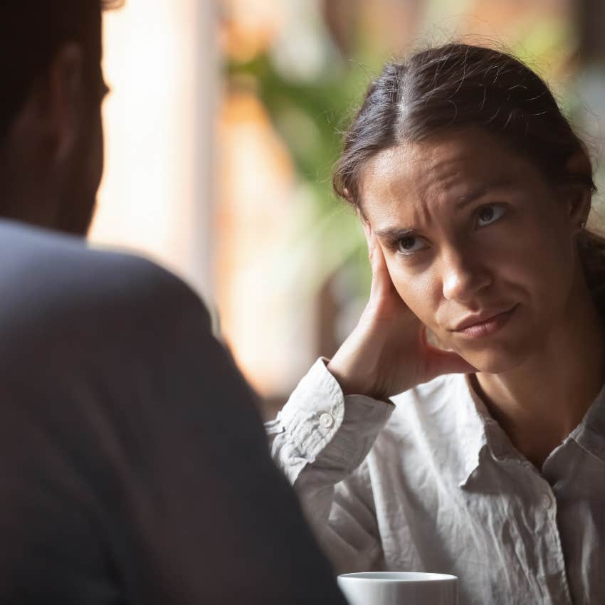 upset woman with man where she's not even on his radar