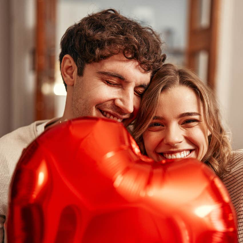 woman smiling next to man who likes her