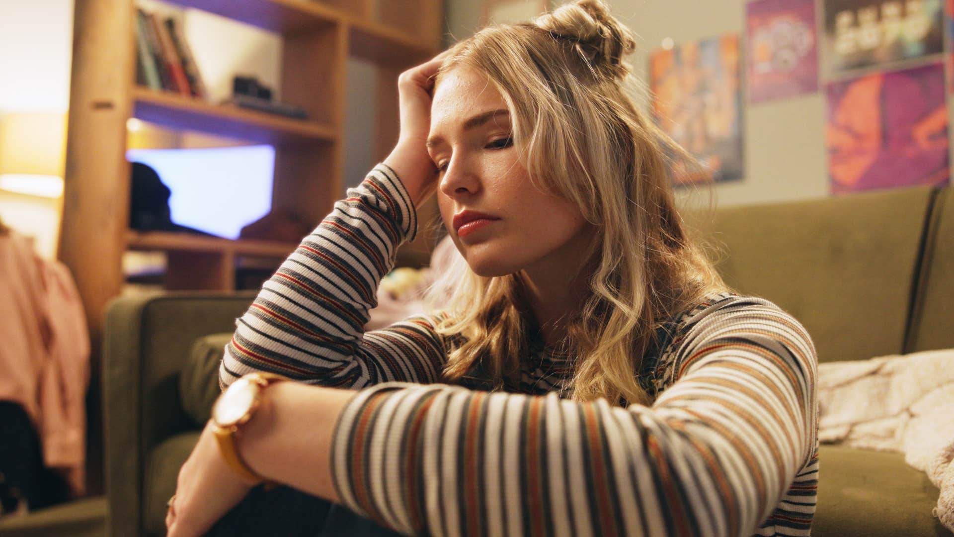 woman battling grief and loss looking sad