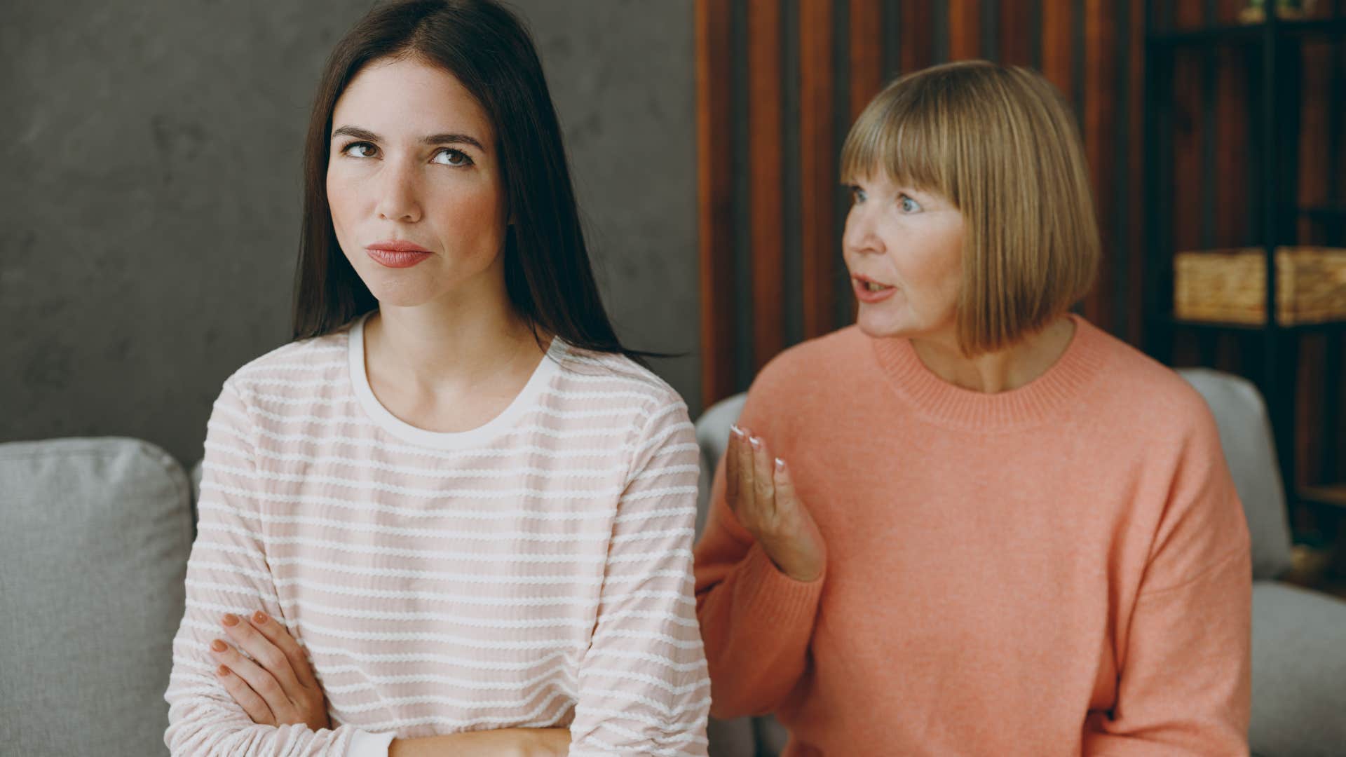 Woman looking annoyed while dealing with a toxic family member.