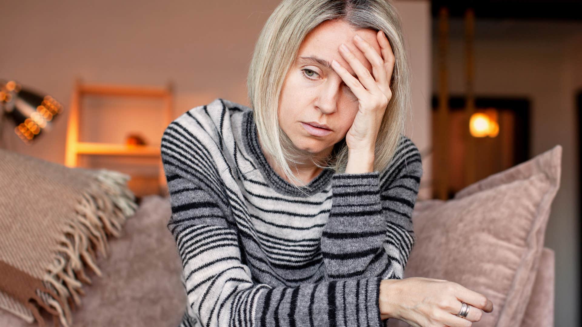 woman suppressing her emotions