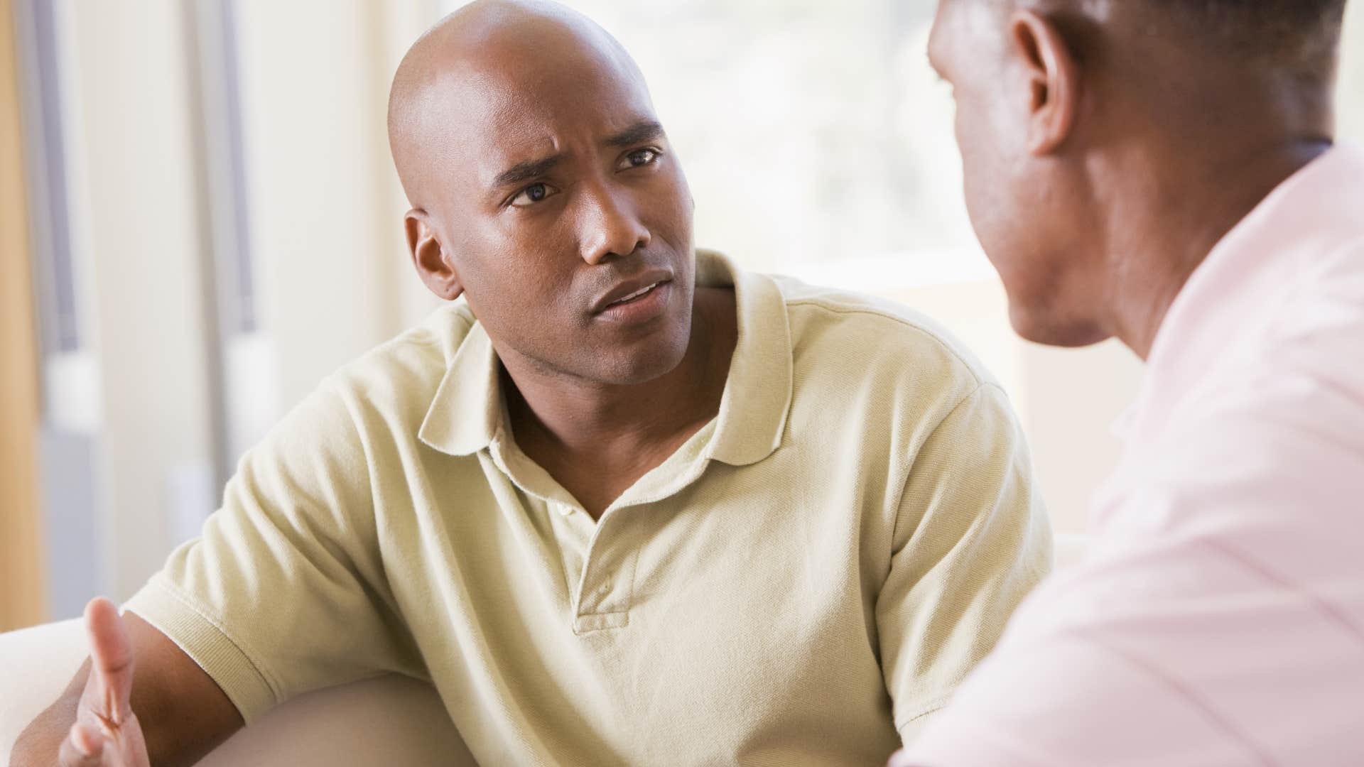 man claiming his friend is gaslighting him
