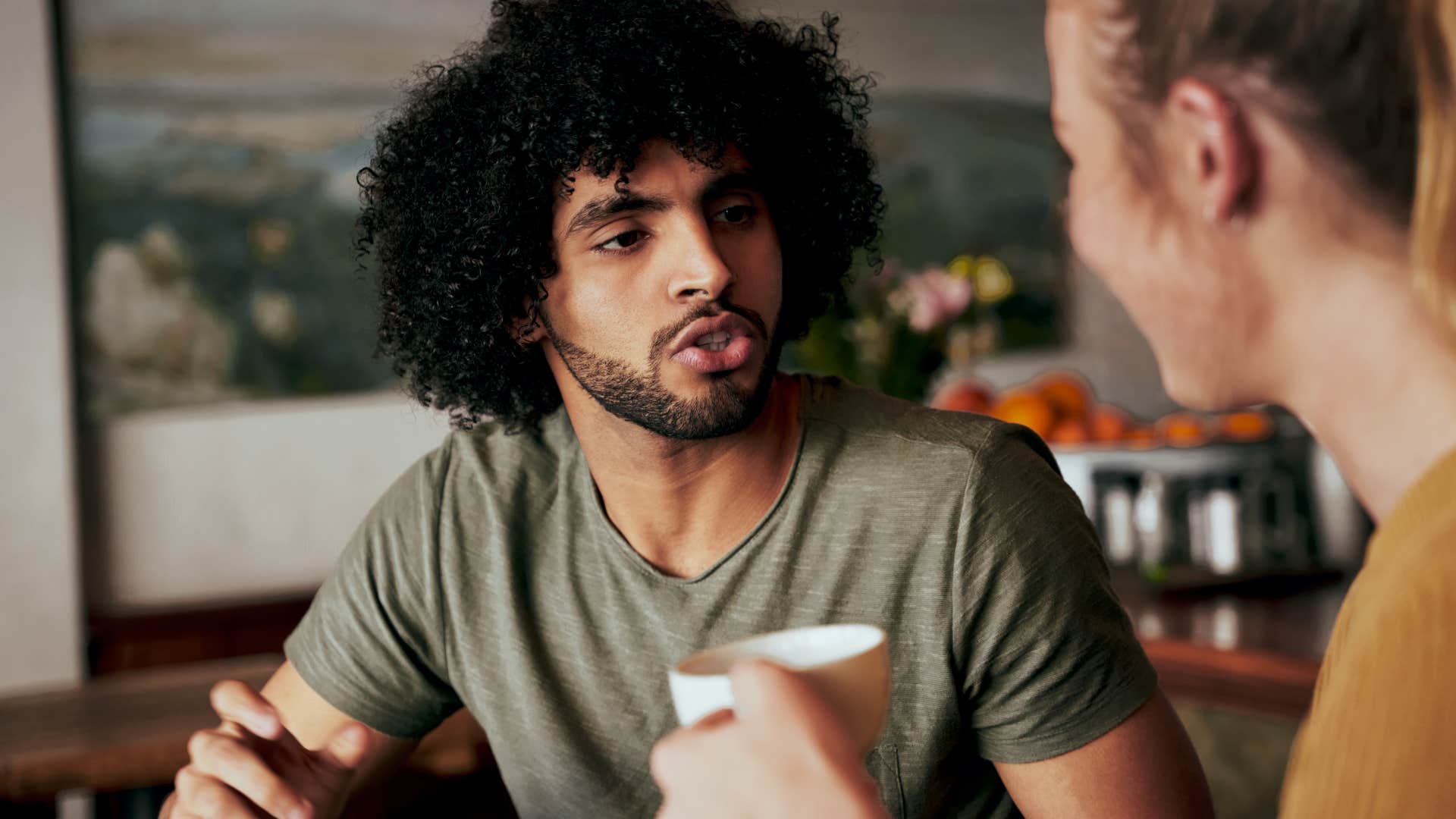 upset man saying it's not fair to his partner