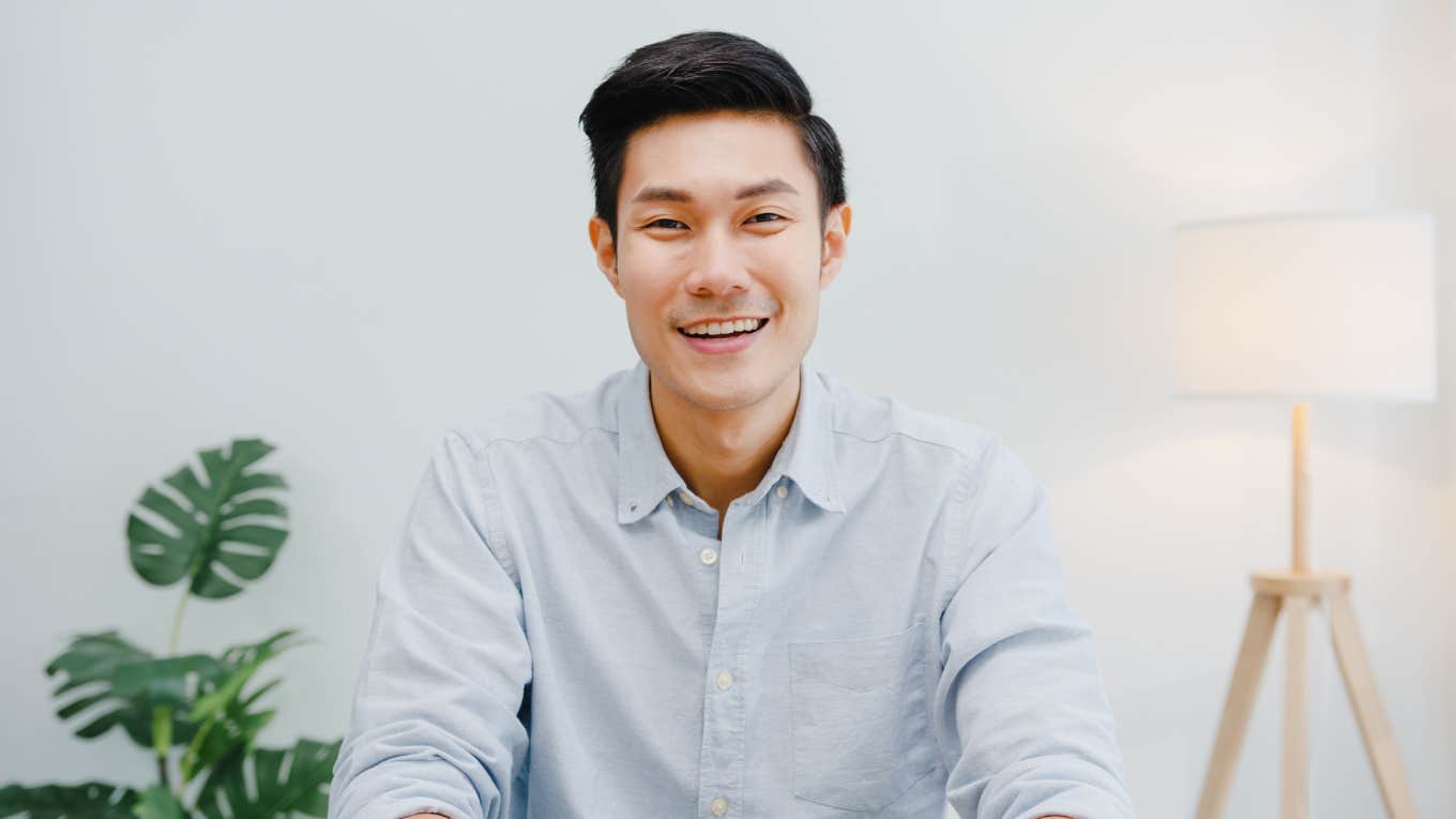 japanese man smiling at camera 