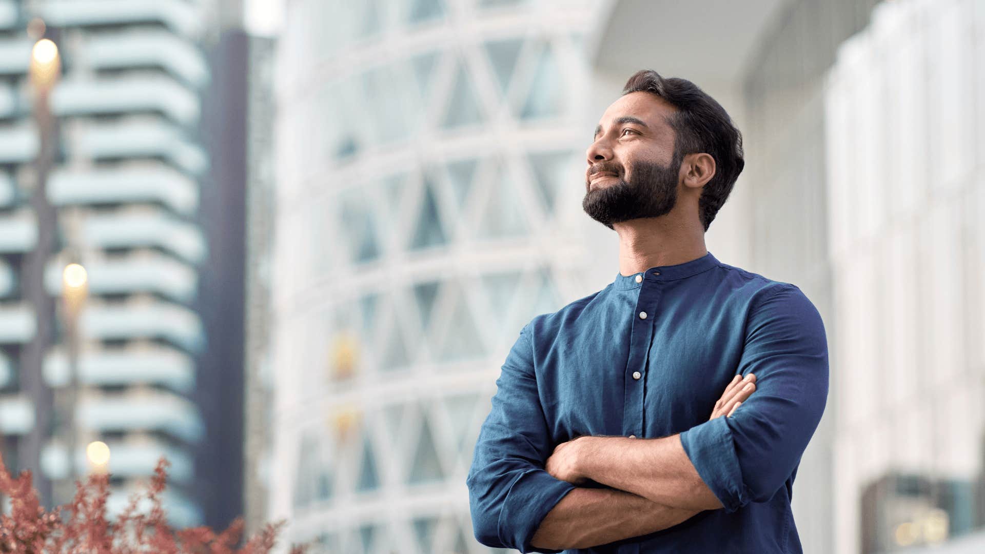 man smiling thinking about life's questions