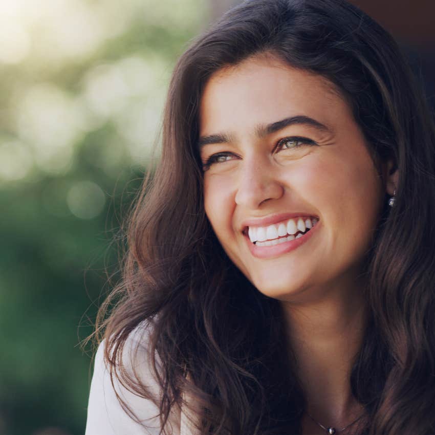 smiling woman after her divorce