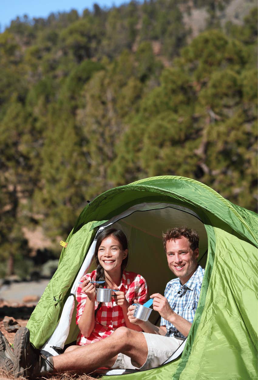 Couple camping fully experience life cant afford travel