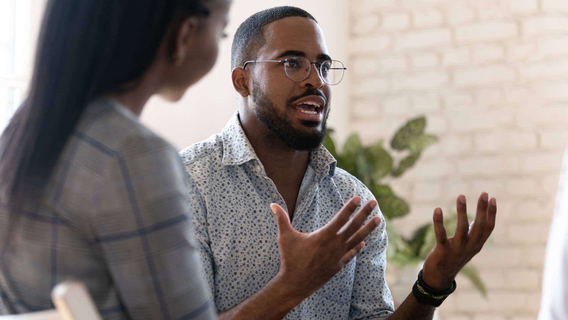 man arguing at work over work-life balance
