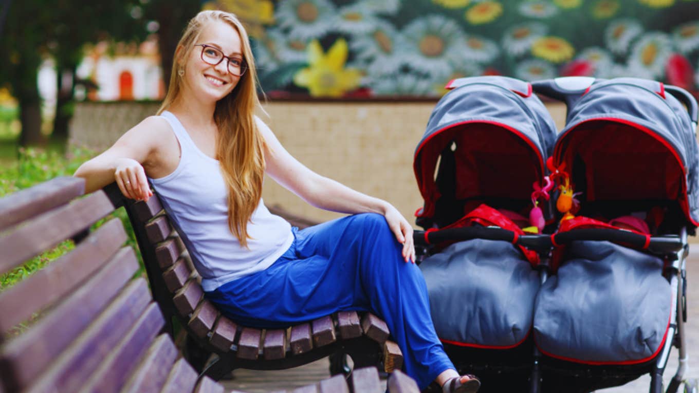 mom with double stroller for kids 