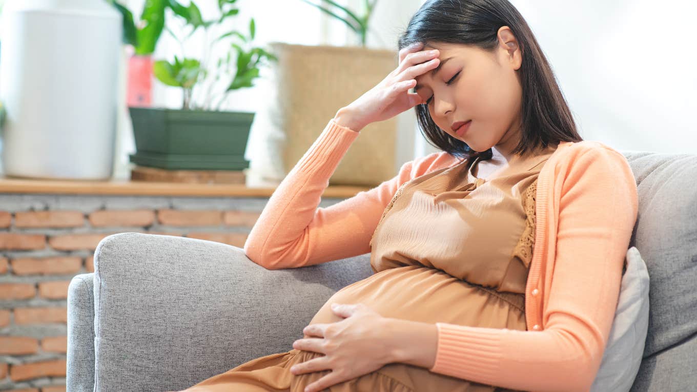 Mom To Be Wants To Ban Her Fiancé's Friends From Coming Over While She's Pregnant tired pregnant woman