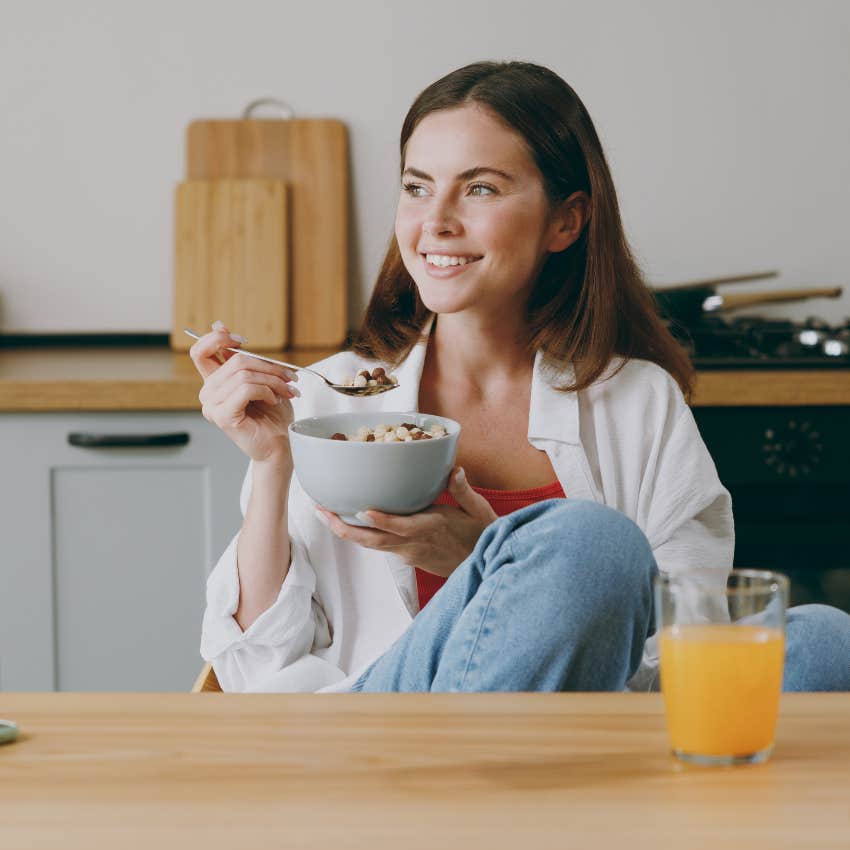 woman with morning ritual of eating breakfast