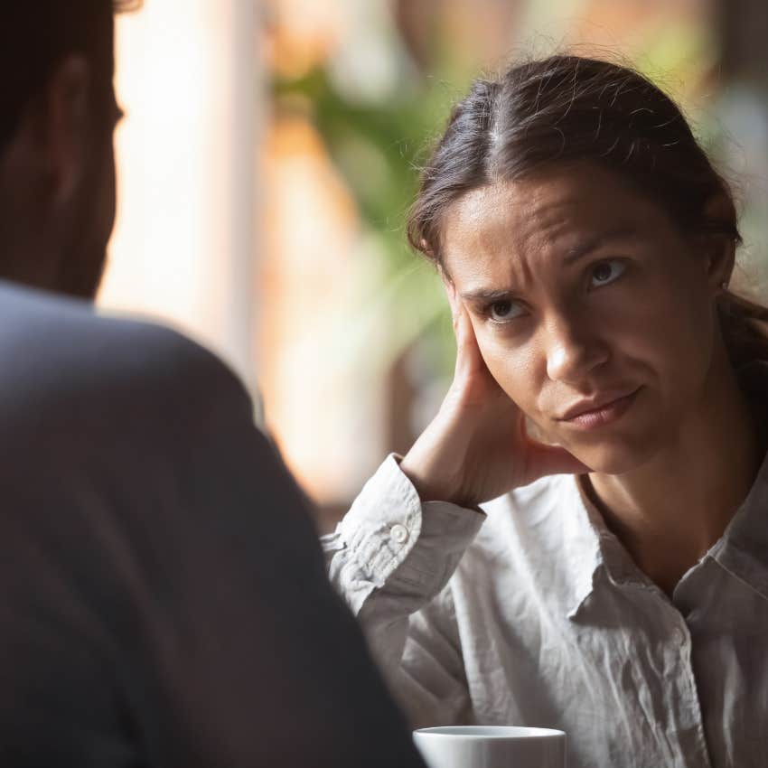upset woman on date with insecure man