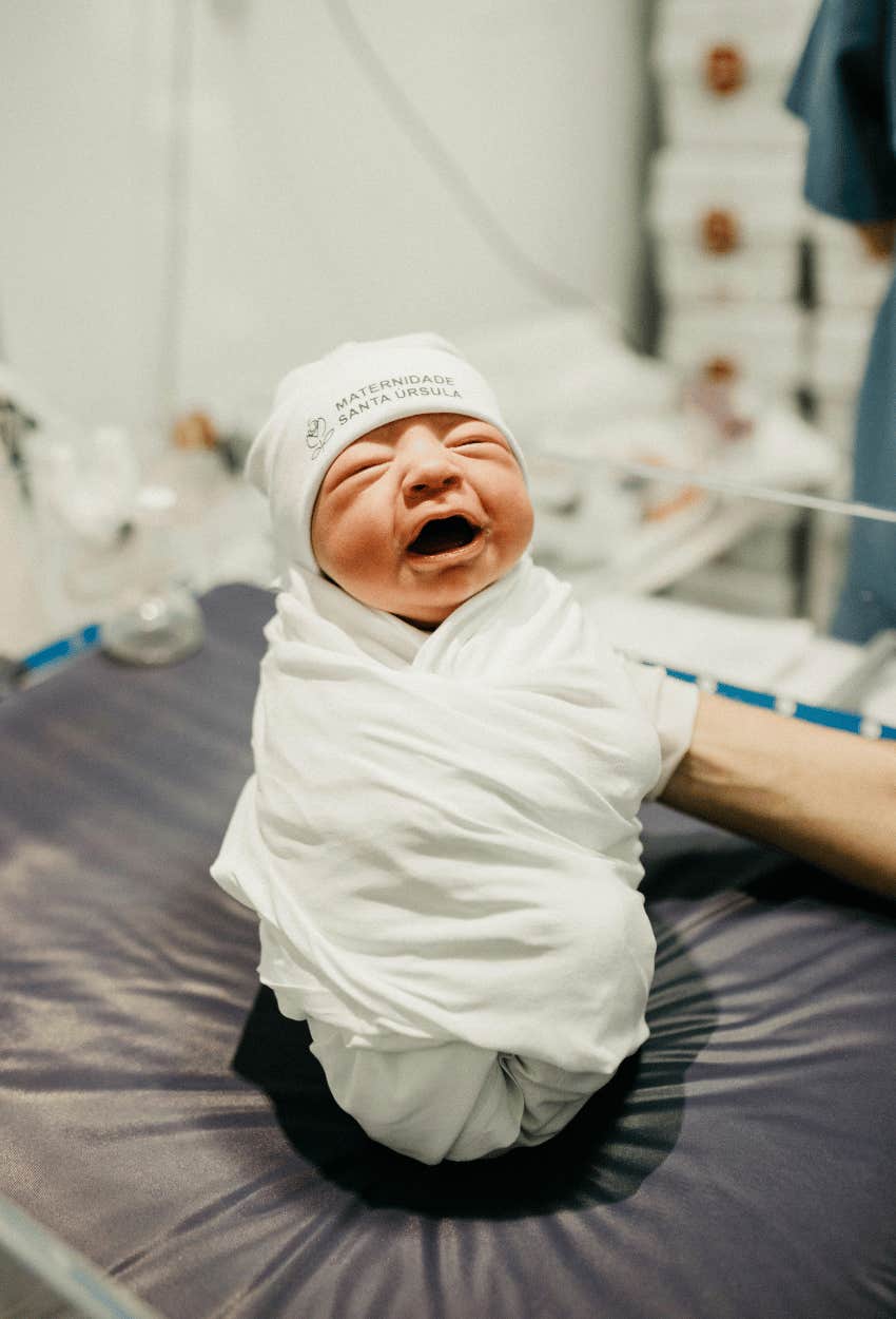 newborn who is making his new dad miserable