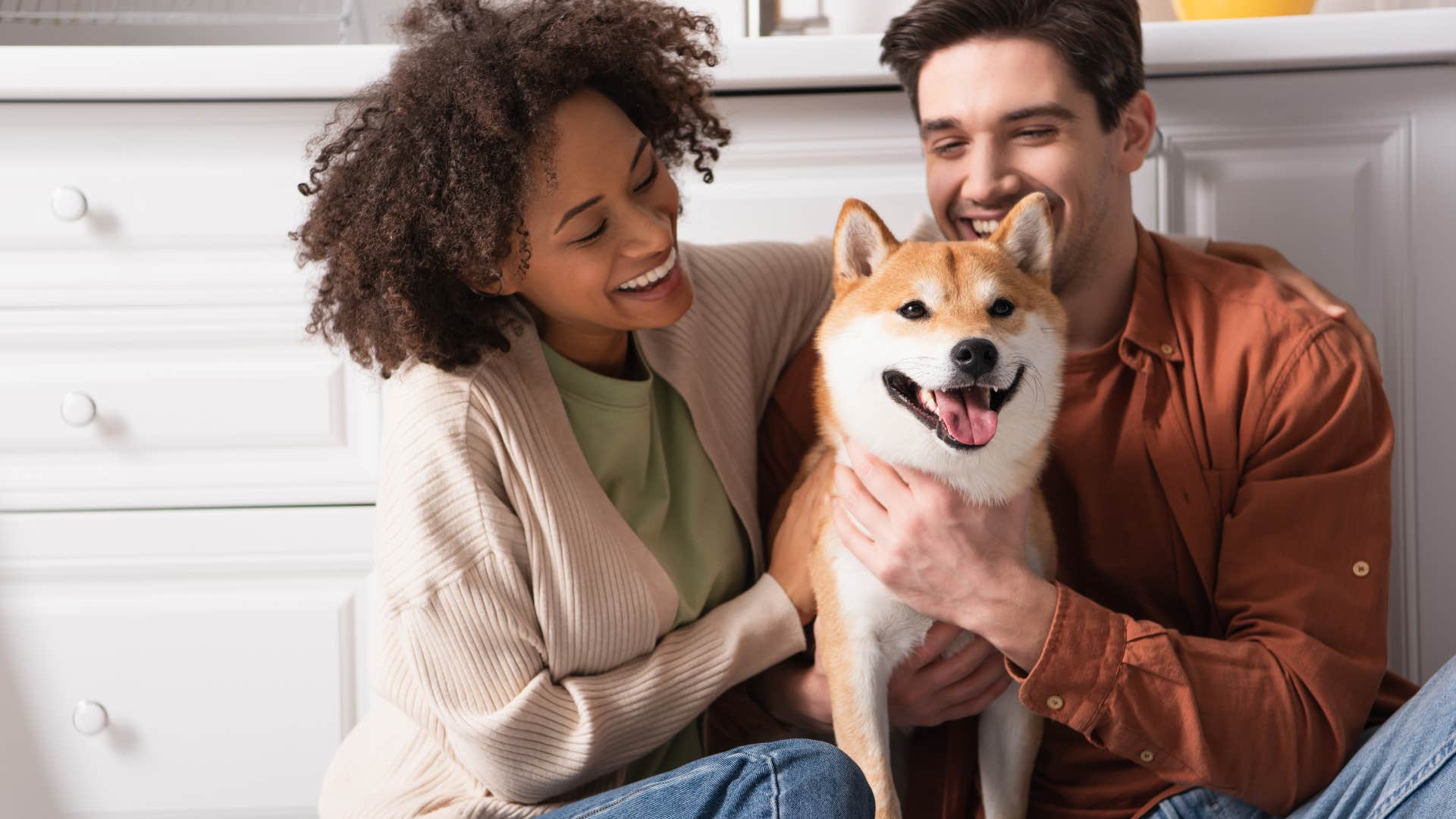 A couple laughs about all of the nicknames they have for their dog