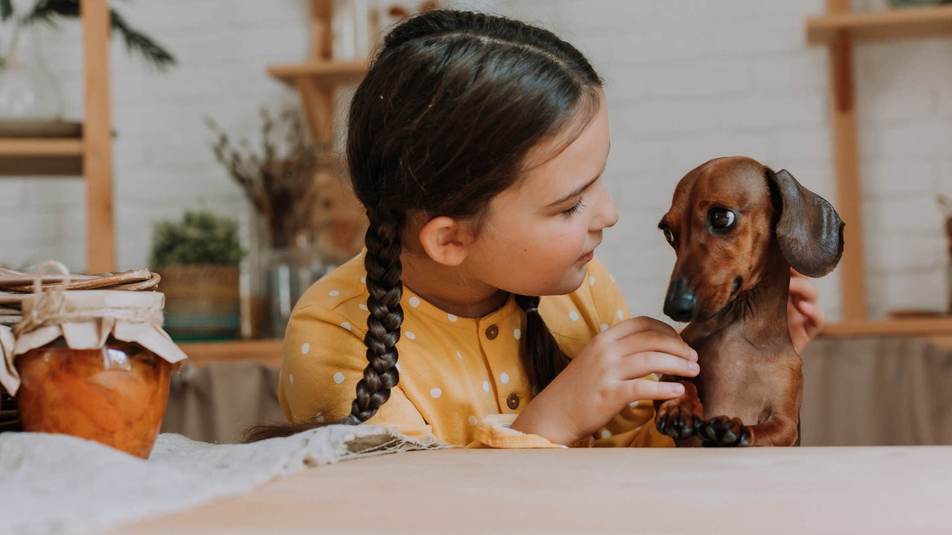 A young girl worries about her dog constantly while she goes to school