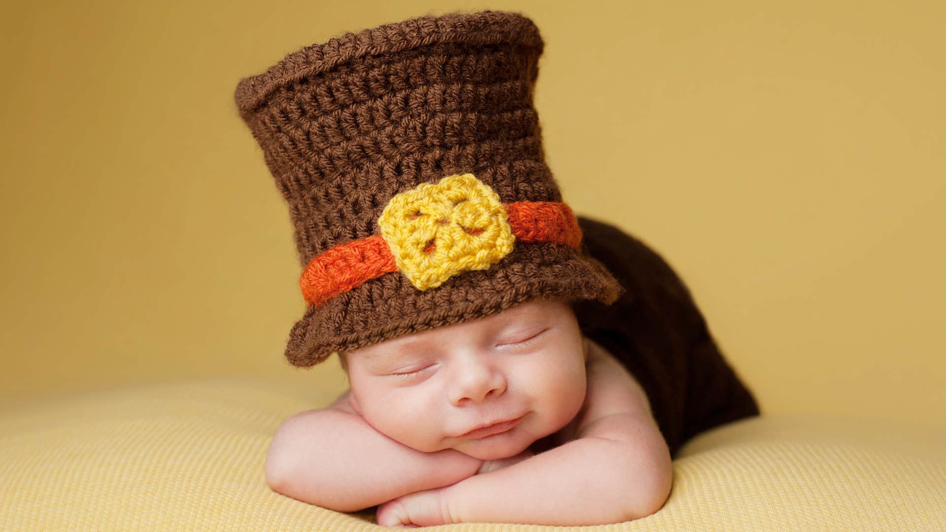 baby boy wearing a pilgrim hat