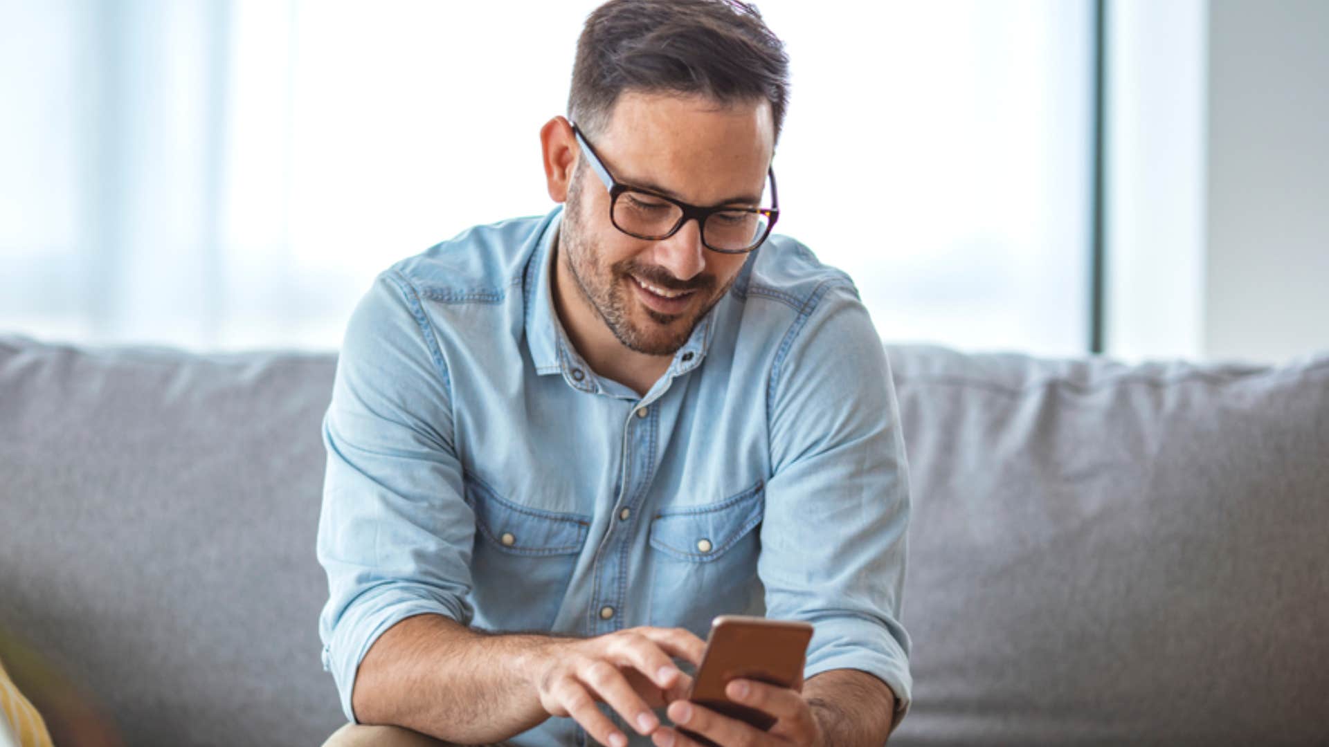 young man texting person asking them to call him when they get the message