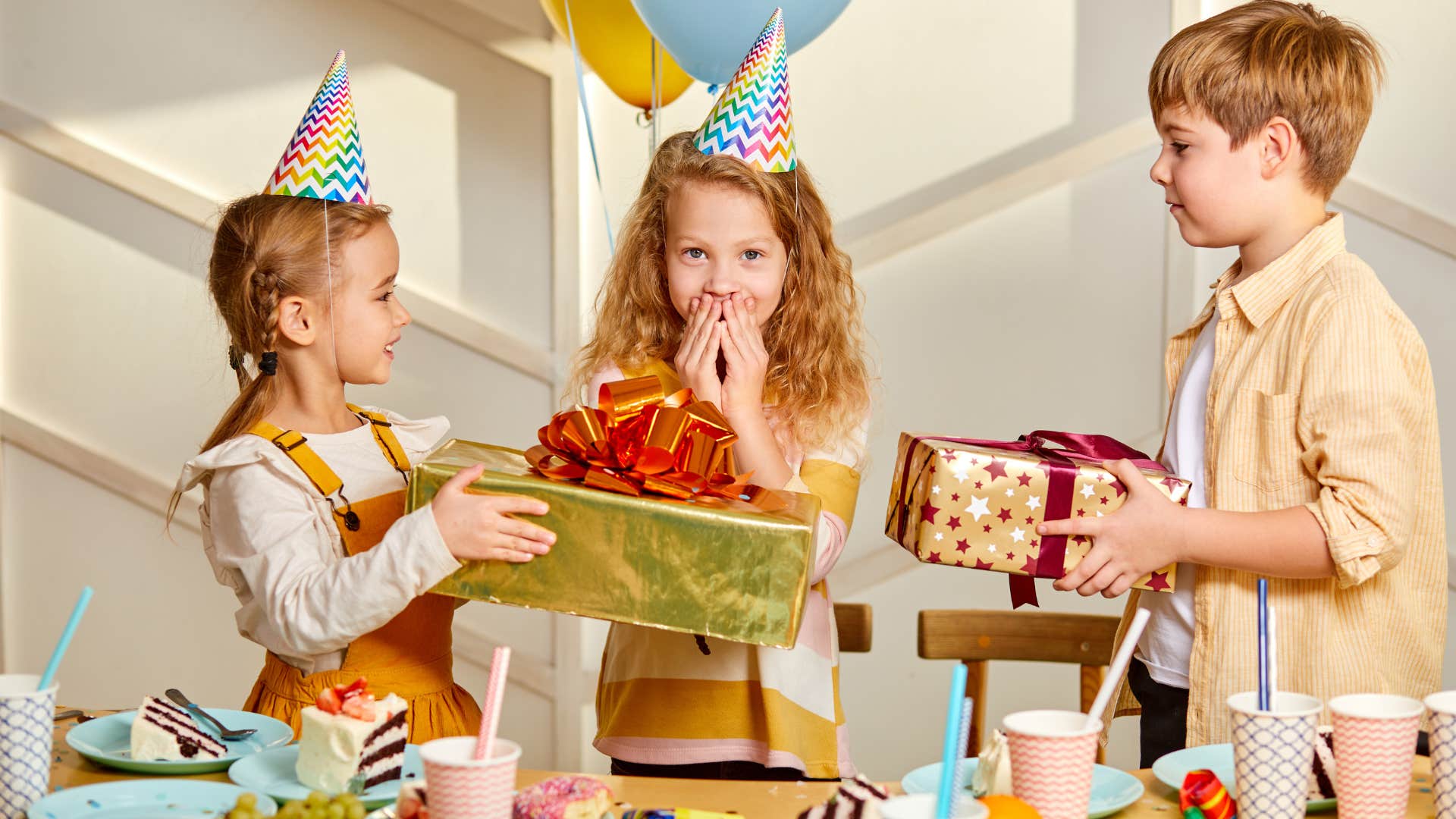children celebrating a birthday making childhood memories
