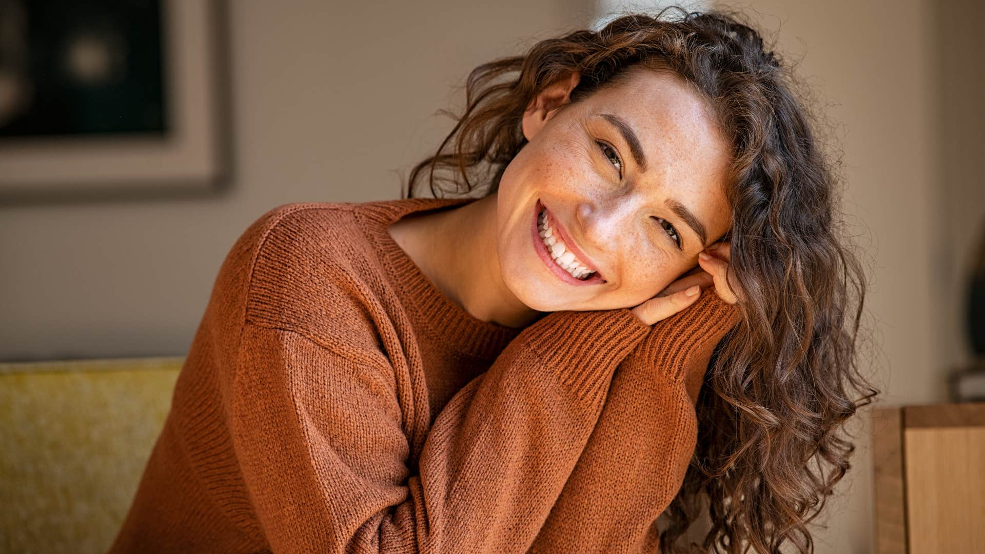 authentic woman smiling at the camera brightly