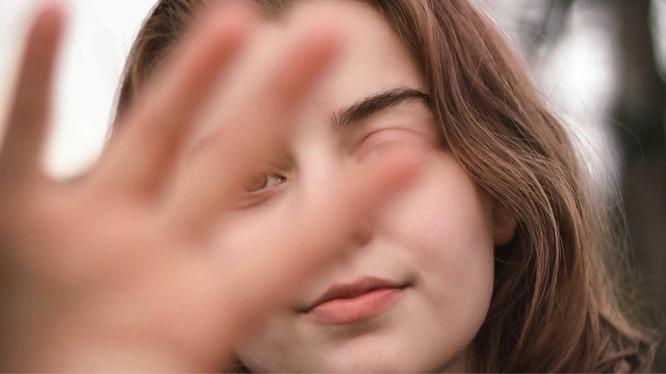 Woman does things with hands and is more likeable.